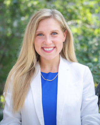 Headshot of Caitlin Dermody